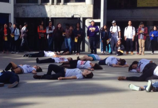 Students lie on the ground at #SFSU for the national day of action against police brutality. 